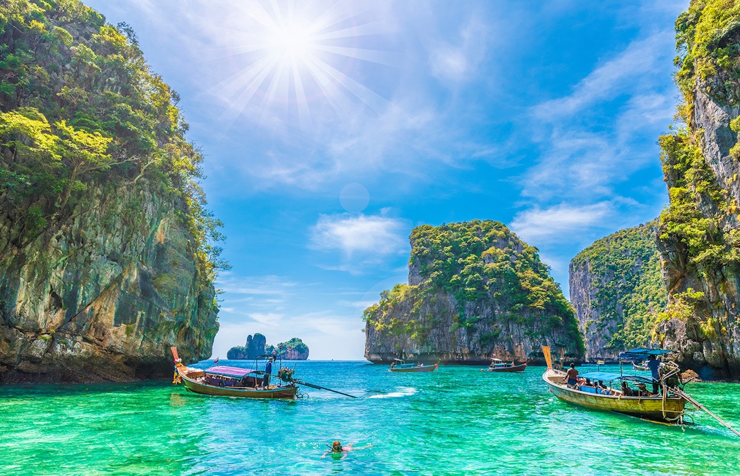 Loh Samah Bay, Thailand, with turquoise waters and limestone cliffs.