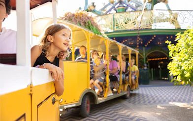 Children enjoying a train ride at Tivoli Gardens, Copenhagen.