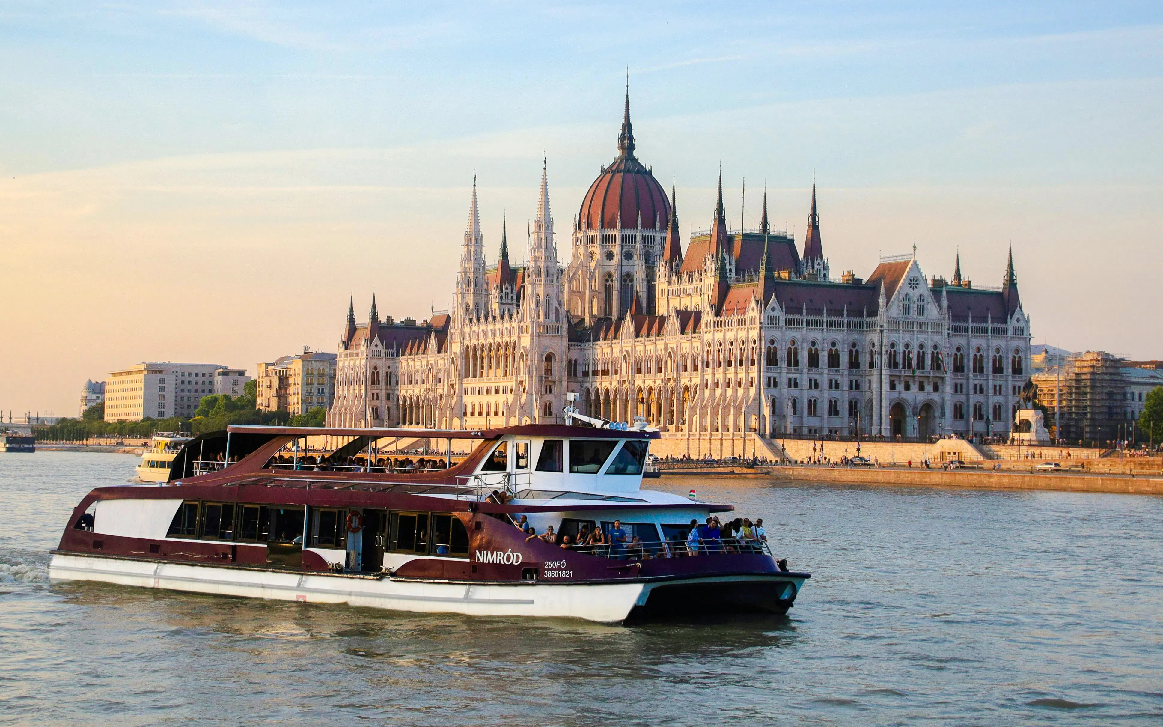 Cruise on the Danube River passing the Hungarian Parliament Building in Budapest.