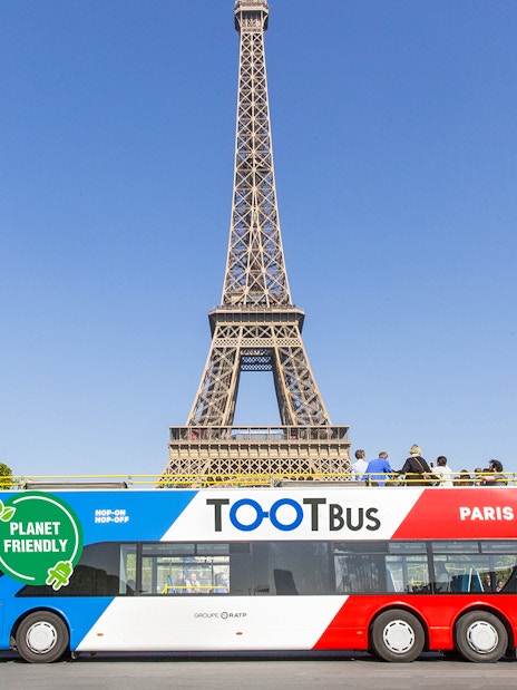 Hop-on hop-off bus near Eiffel Tower, Paris.