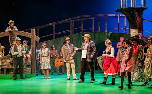 Performers on stage in Finian’s Rainbow at Hybernia Theatre, Prague.