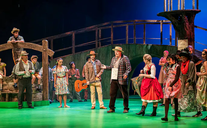 Performers on stage in Finian’s Rainbow at Hybernia Theatre, Prague.