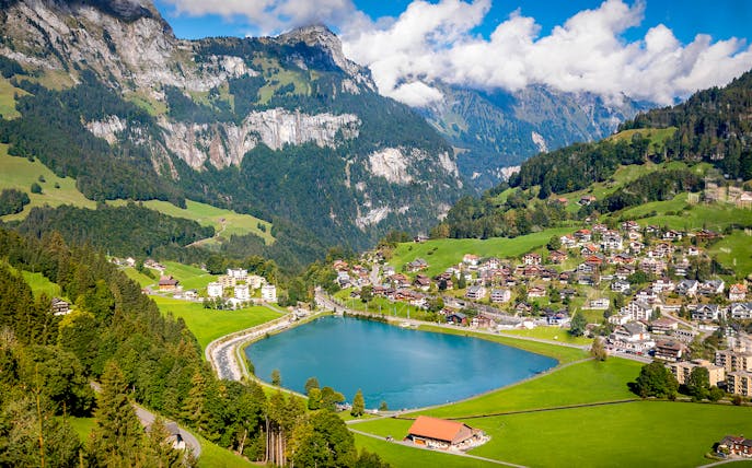 Engelberg village and lake with Mount Titlis cable car views, Switzerland.