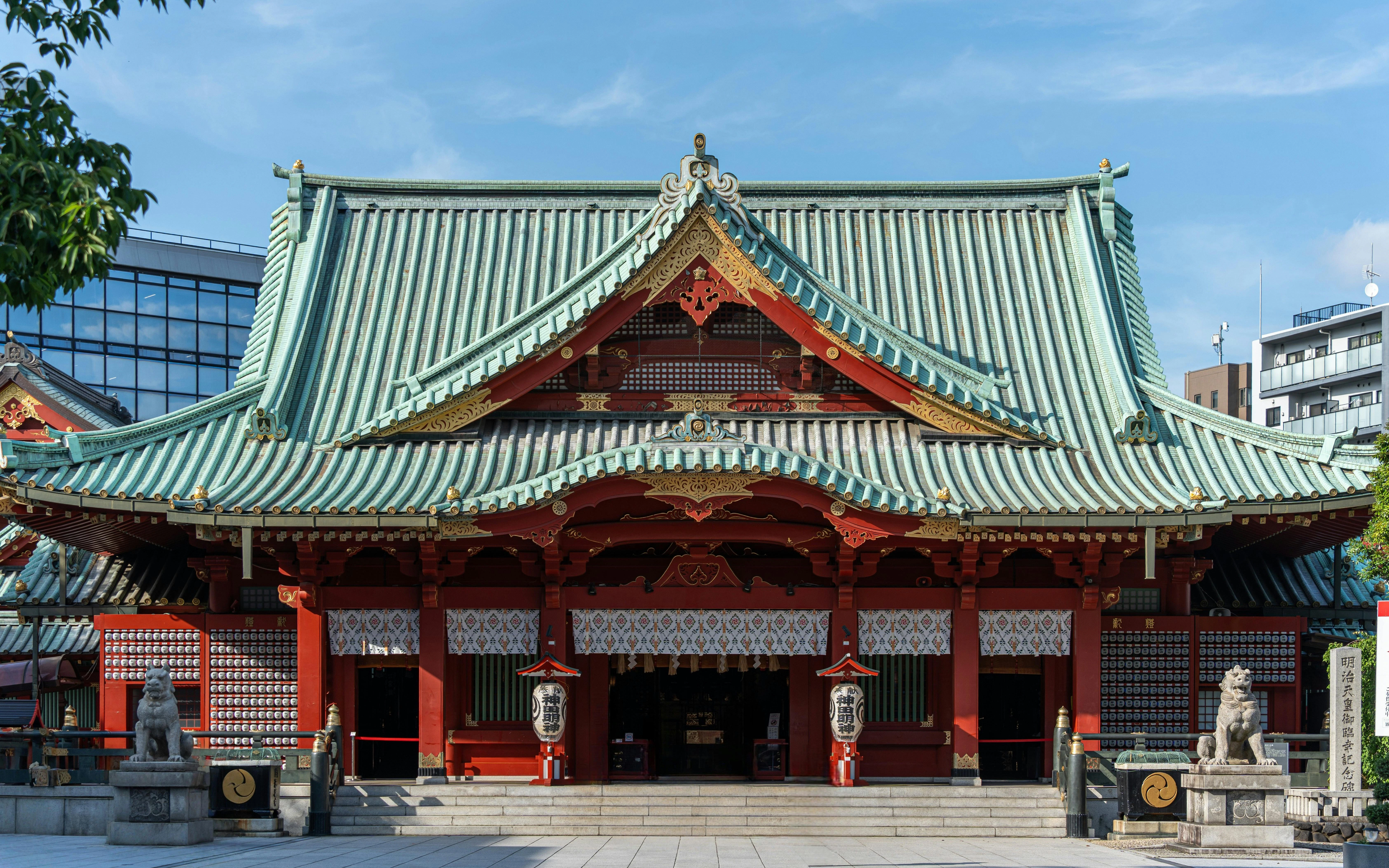 Main hall of Kanda Myojin Shrine in Tokyo with traditional architecture.