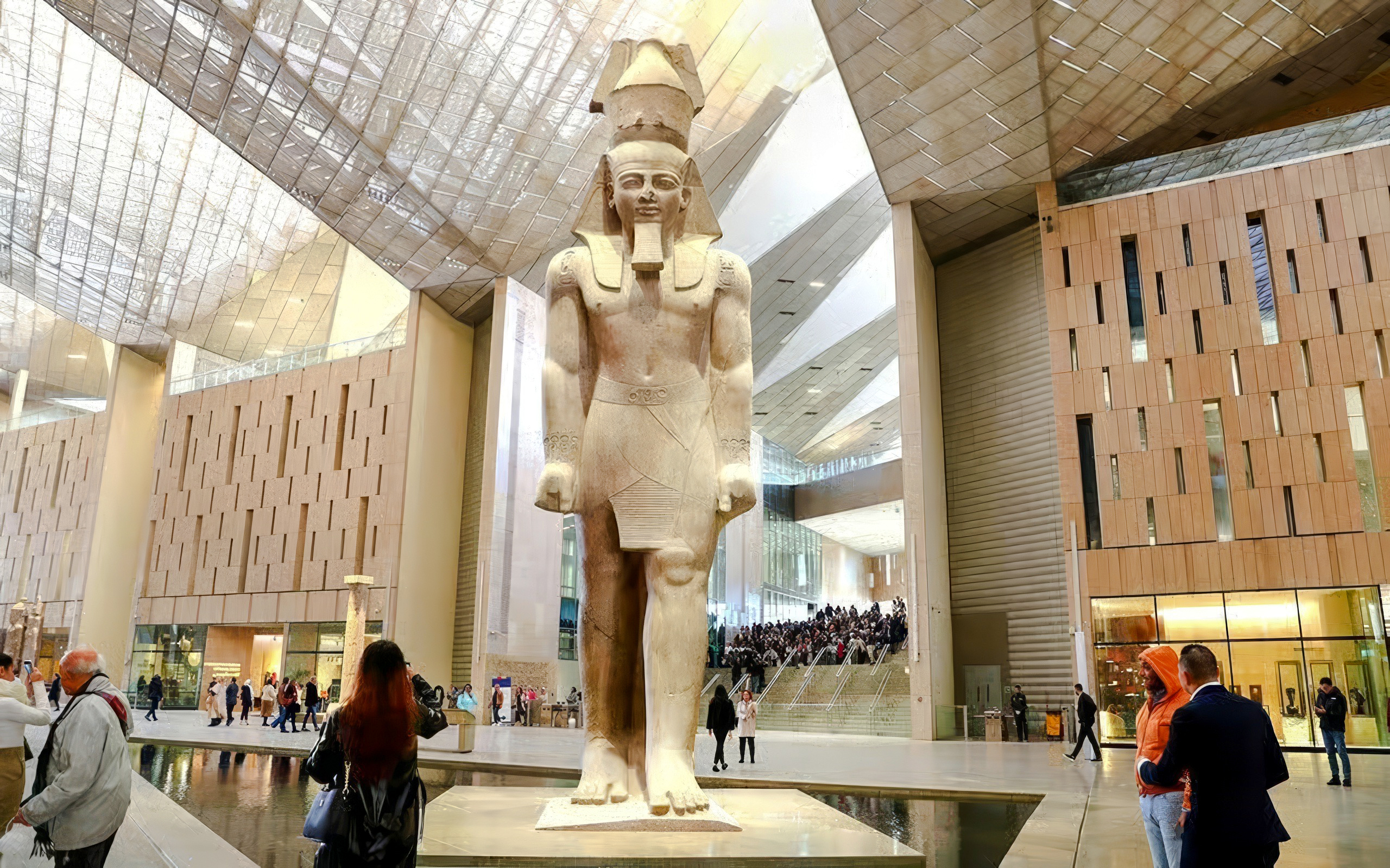 Statue of Pharaoh in Grand Hall of the Grand Egyptian Museum, Giza, Cairo day trip from Hurghada.