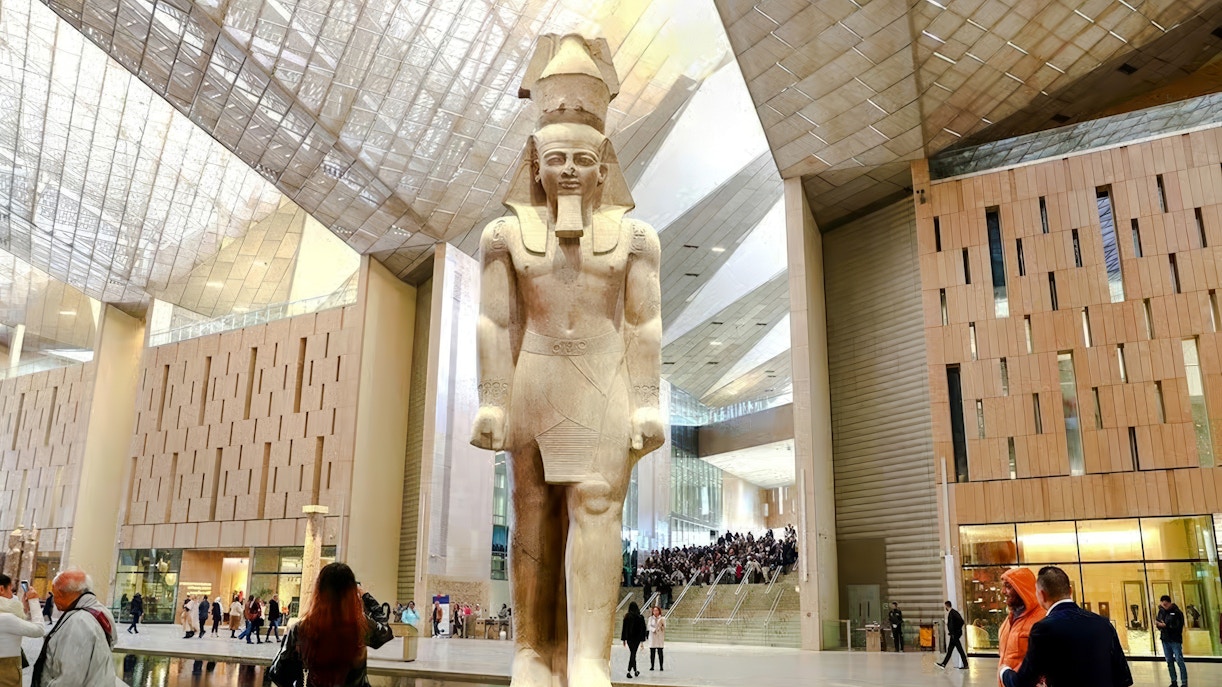 Statue of Pharaoh in Grand Hall of the Grand Egyptian Museum, Giza, Cairo day trip from Hurghada.