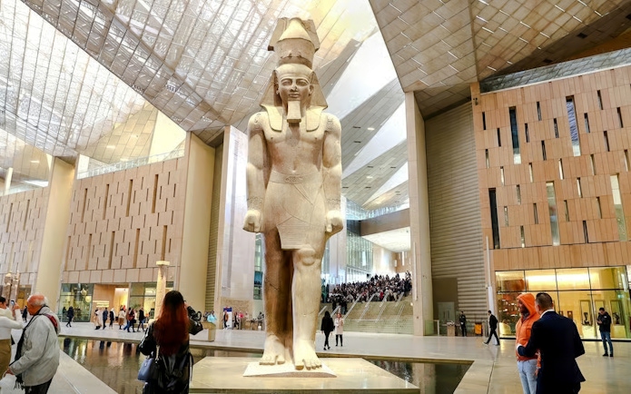 Statue of Pharaoh in Grand Hall of the Grand Egyptian Museum, Giza, Cairo day trip from Hurghada.