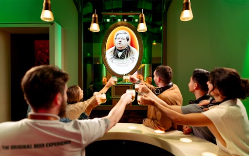 Group toasting with beer at Prague Pilsner Urquell Experience.