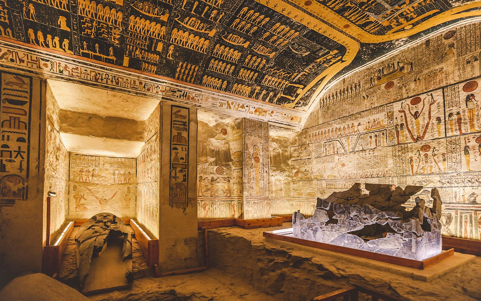 White stone sarcophagus in the Valley of the Kings tomb, Luxor, Egypt, with hieroglyphs.