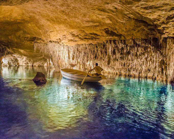 From Palma: Caves of Drach and Hams Entrance and Pearl Factory Visit