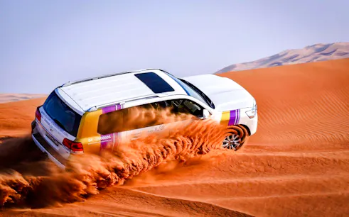 safari matutino por el desierto de dubái con conducción en dunas en 4x4, paseo en camello y traslados-1