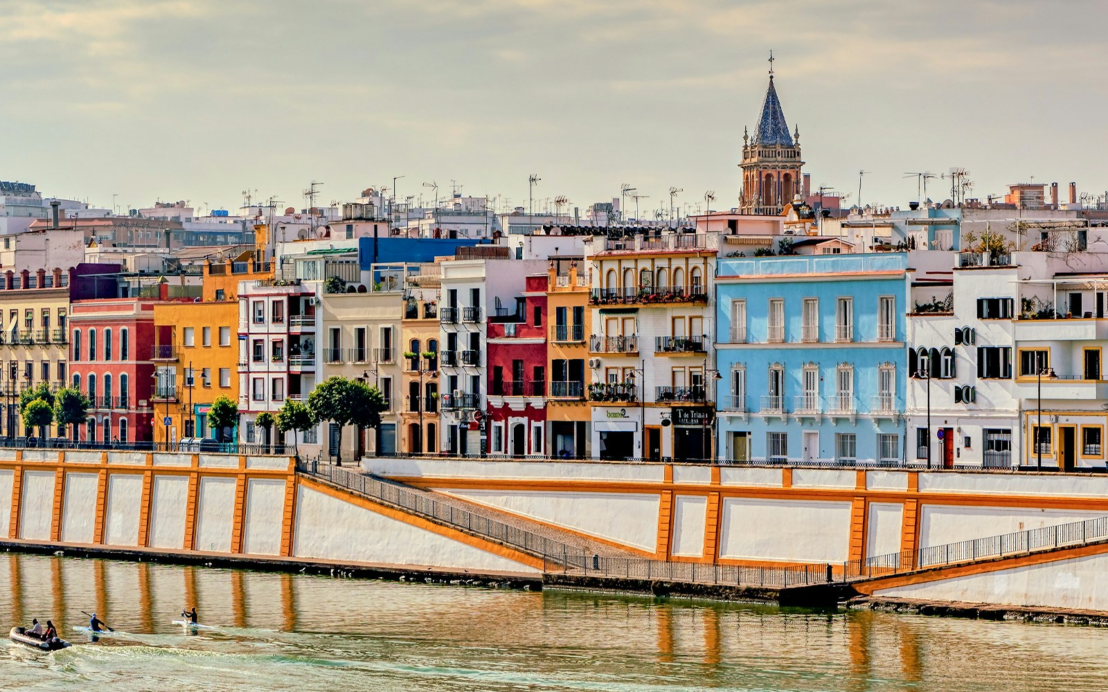 Colorful Triana neighborhood on the banks of Guadalquivir river in Seville