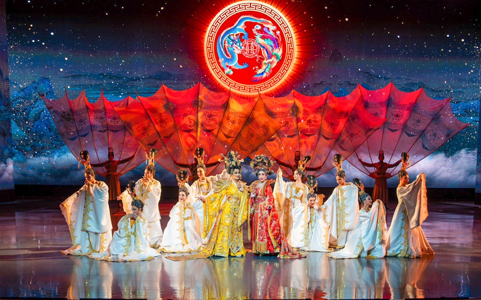 Performers in traditional costumes on stage at Colosseum Cabaret Show, Pattaya.