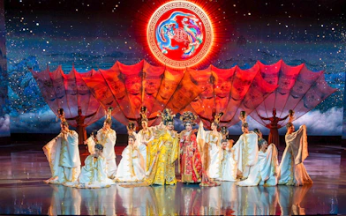 Performers in traditional costumes on stage at Colosseum Cabaret Show, Pattaya.