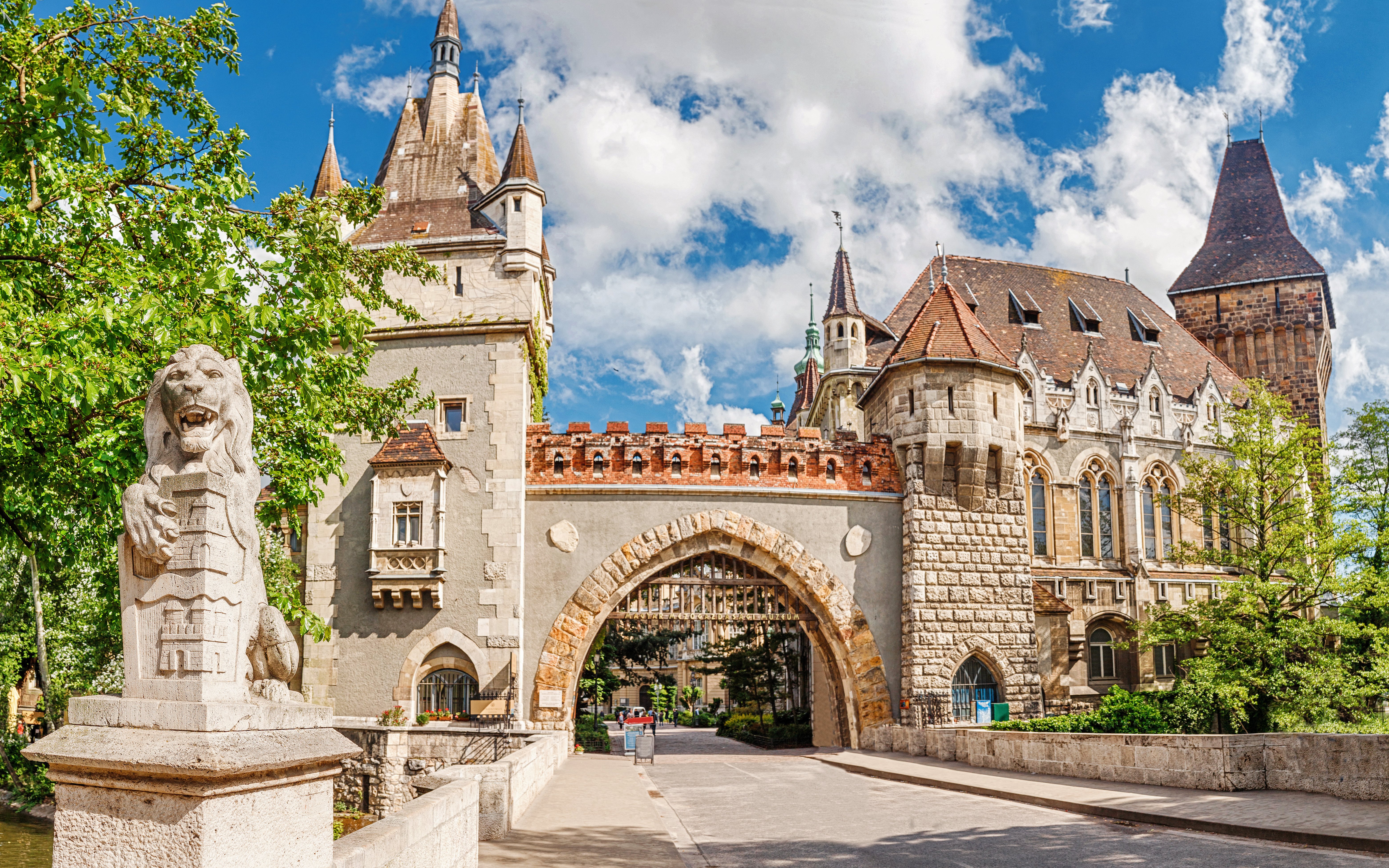 Vajdahunyad Castle entrance gate with lion statue, Budapest, Hungary.