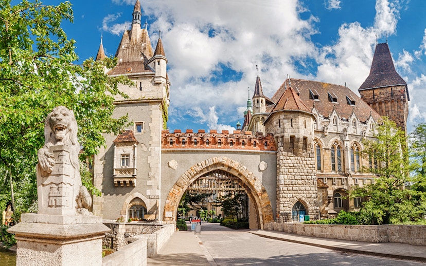 Vajdahunyad Castle entrance gate with lion statue, Budapest, Hungary.