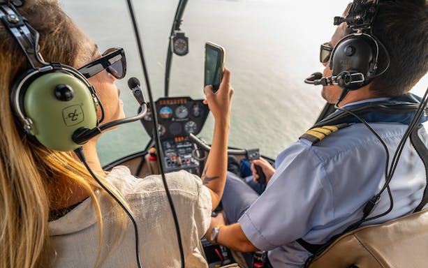 Helicopter passengers view Lisbon's coastline during a 10-minute flight.