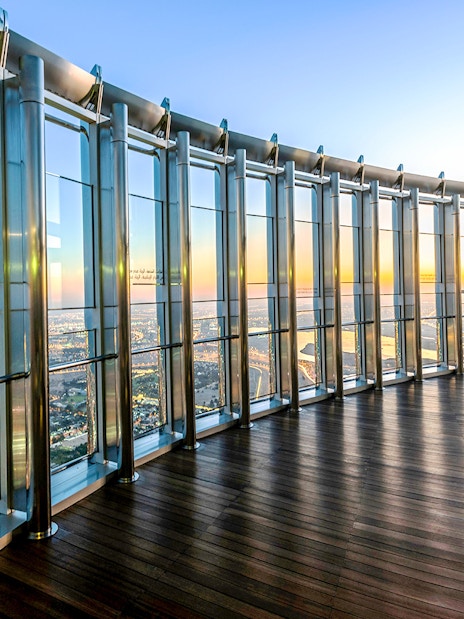 Observation deck view from Burj Khalifa At The Top, overlooking Dubai cityscape.