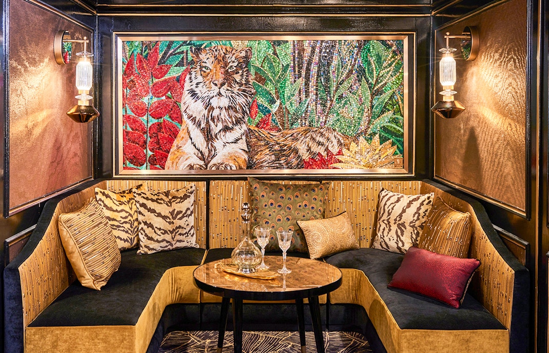 Paradis Latin dinner tables set for cabaret show in Paris, France.