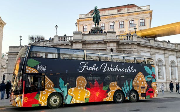 Big Bus decorated for Christmas in front of the Albertina Museum, Vienna.