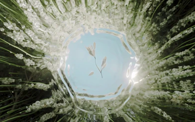 Abstract floral artwork at Moco Amsterdam with green and white elements.