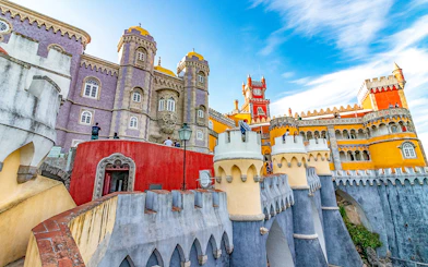Pena Palace in Sintra, Portugal, showcasing colorful architecture and intricate details.