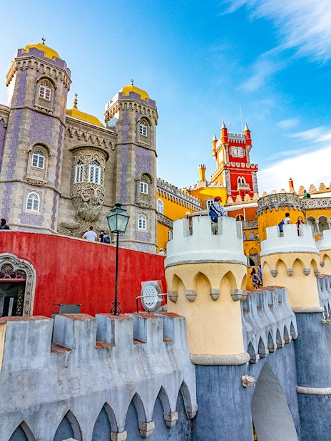 Pena Palace in Sintra, Portugal, showcasing colorful architecture and intricate details.