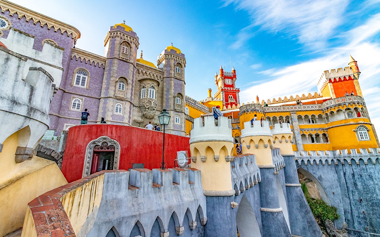 Pena Palace in Sintra, Portugal, showcasing colorful architecture and intricate details.
