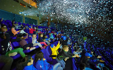 Visitors enjoying a 4D cinema experience at Oceanogràfic, Valencia.