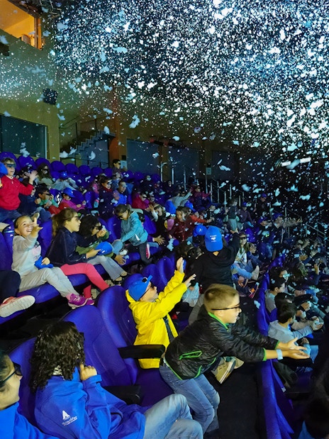 Visitors enjoying a 4D cinema experience at Oceanogràfic, Valencia.