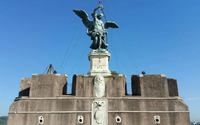 Statue of Archangel Michael atop Castel Sant'Angelo in Rome, Italy.