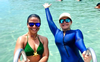 Women enjoying the water at Archipiélago de Las Perlas, Panama City.
