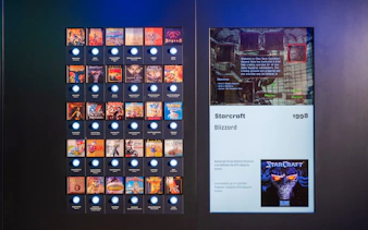 Display of classic video game covers and Starcraft exhibit at Video Game History Museum, Zagreb.
