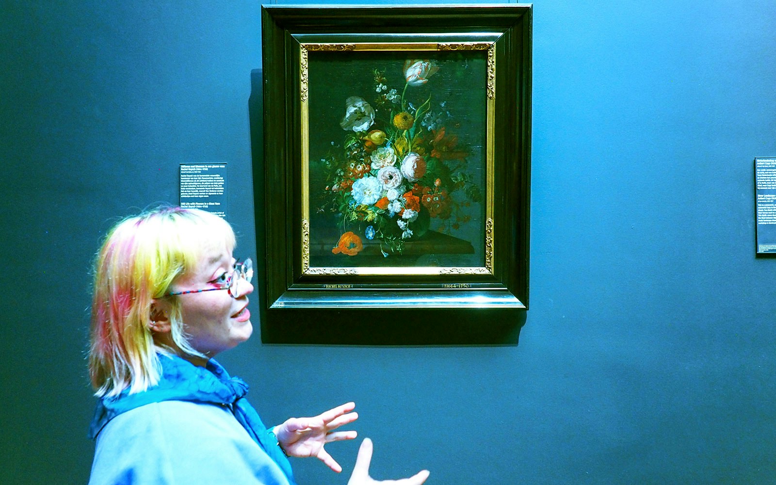 Guide explaining a floral painting at the Rijksmuseum during a private tour.