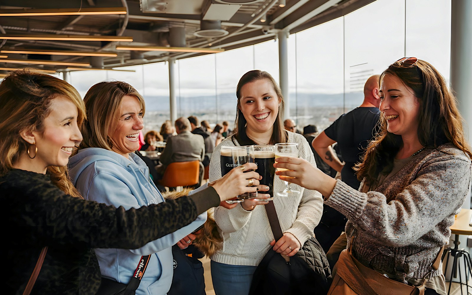 Visitors exploring Dublin Castle courtyard during Book of Kells, Guinness, and Whiskey Tour.