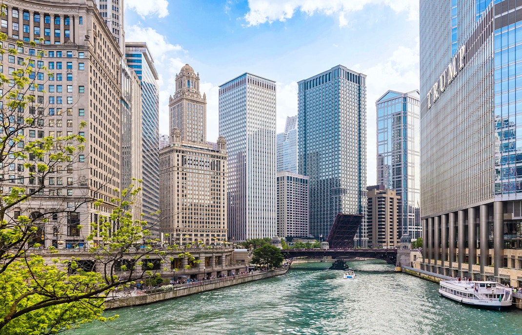 Tribune Tower and Chicago River with skyscrapers in downtown Chicago.