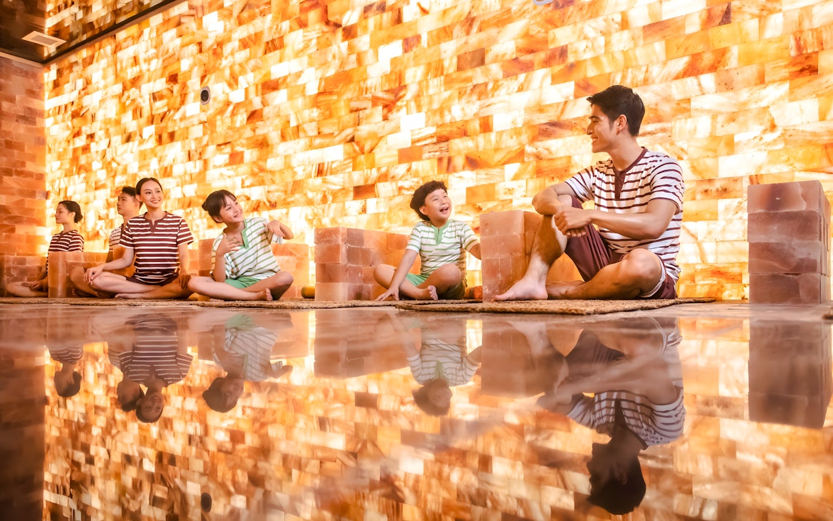 Family enjoying sauna at Aquafield Nha Trang, Vietnam's Korean-style wellness complex.