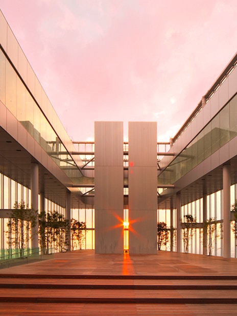 Harukas 300 Observatory interior with sunset view through glass walls.