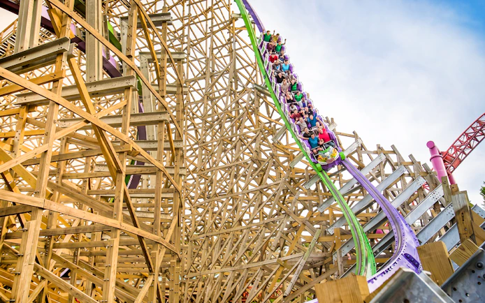 Roller coaster riders on THE JOKER™ at Six Flags Discovery Kingdom, California.