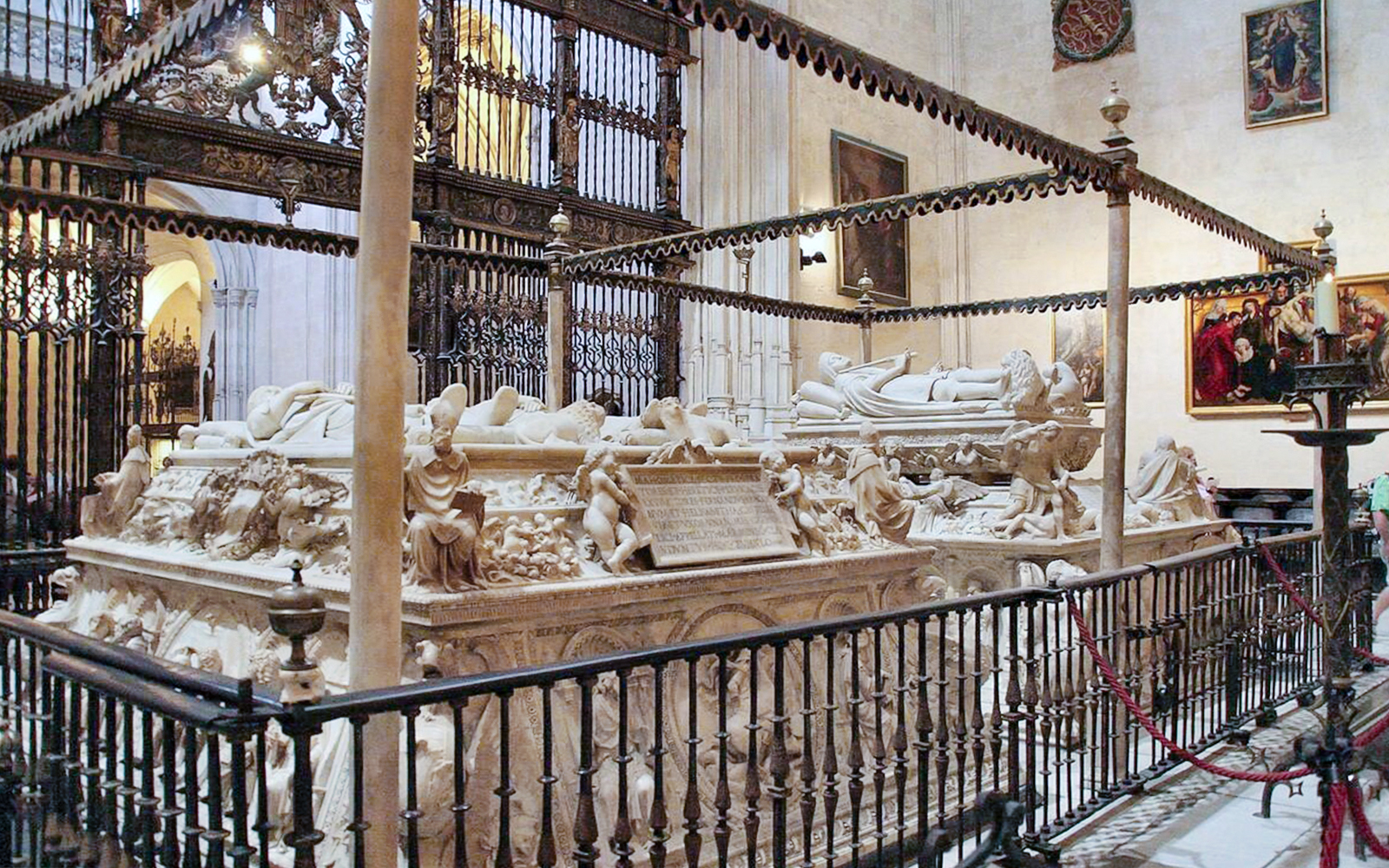 Royal Chapel tombs in Granada, featuring intricate carvings and historical significance.