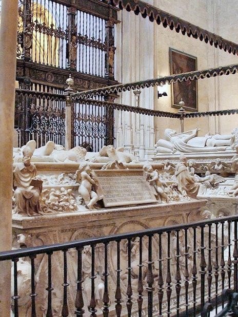 Royal Chapel tombs in Granada, featuring intricate carvings and historical significance.