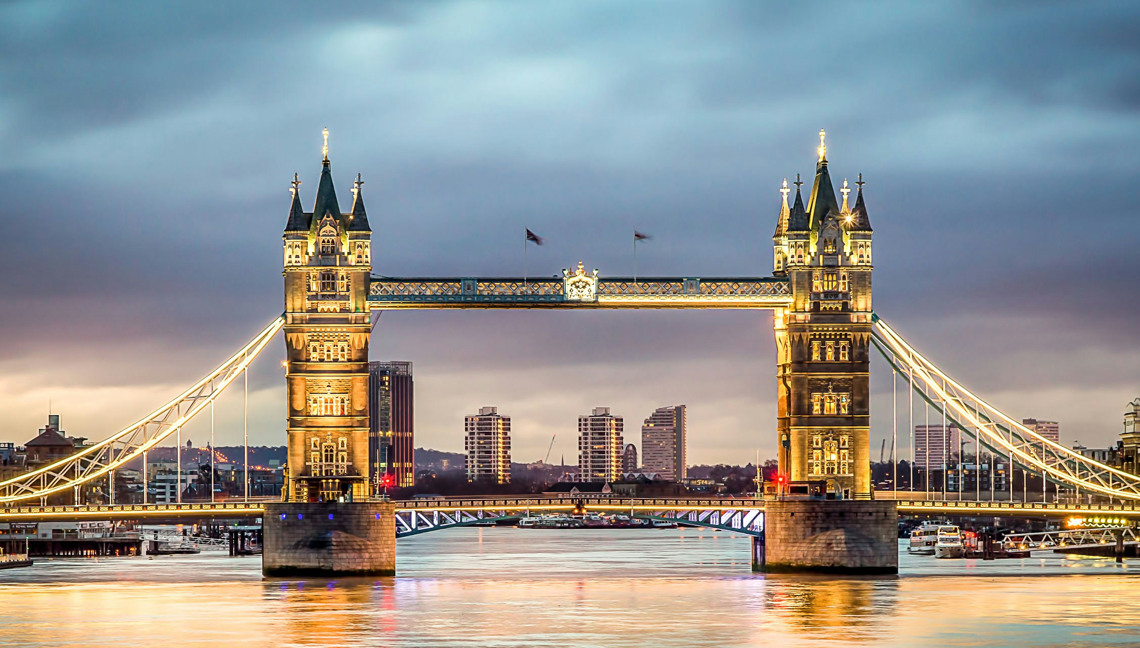 Tower Bridge illuminated at dusk, London, near Madame Tussauds.