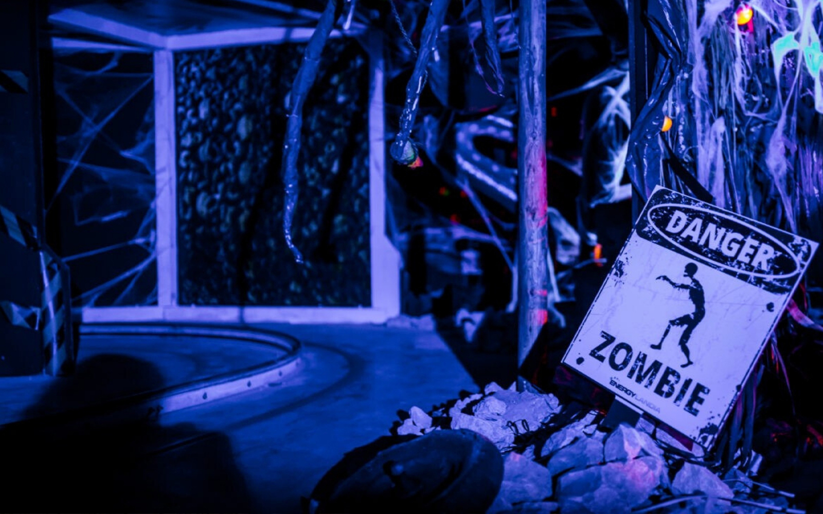 Monster House ride at Energylandia amusement park, featuring a colorful, whimsical facade.