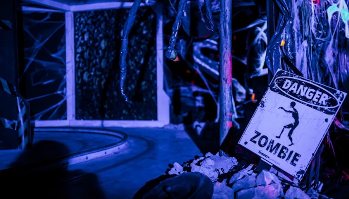 Monster House ride at Energylandia amusement park, featuring a colorful, whimsical facade.