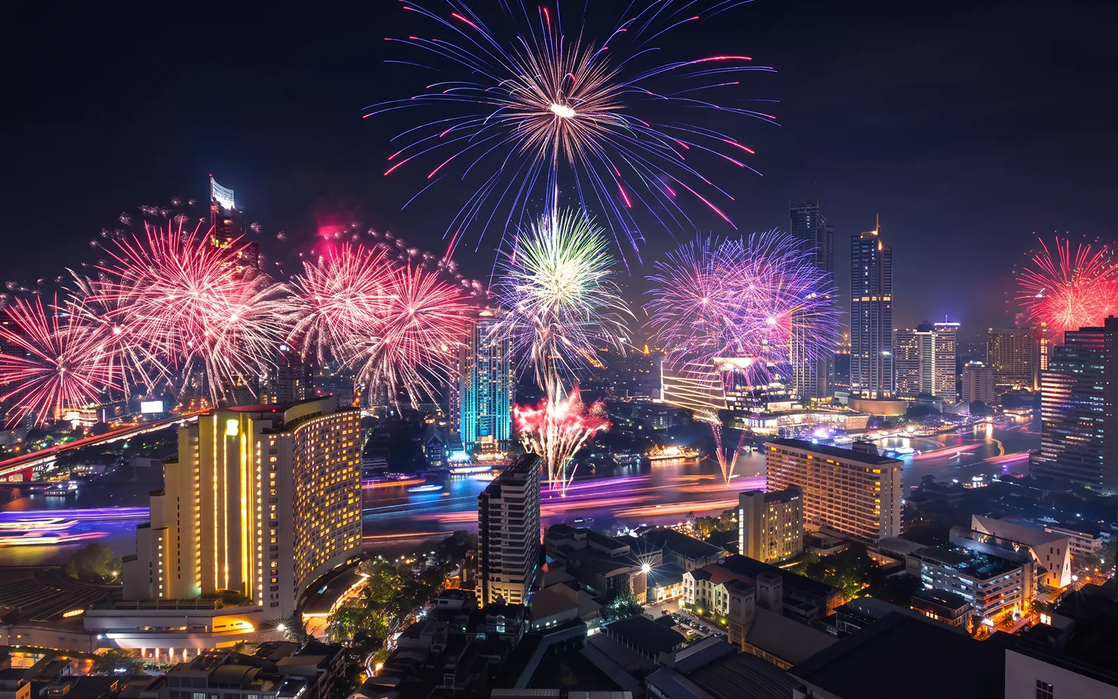 Fireworks over Bangkok skyline during Noah Cruise.