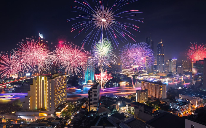 Fireworks over Bangkok skyline during Noah Cruise.
