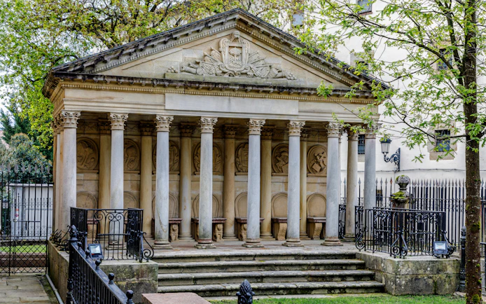 Gernika's Assembly House with columns near the "Old Tree" trunk, Spain.