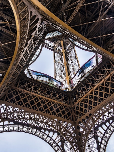 Eiffel Tower iron lattice structure viewed from below, Paris, France.