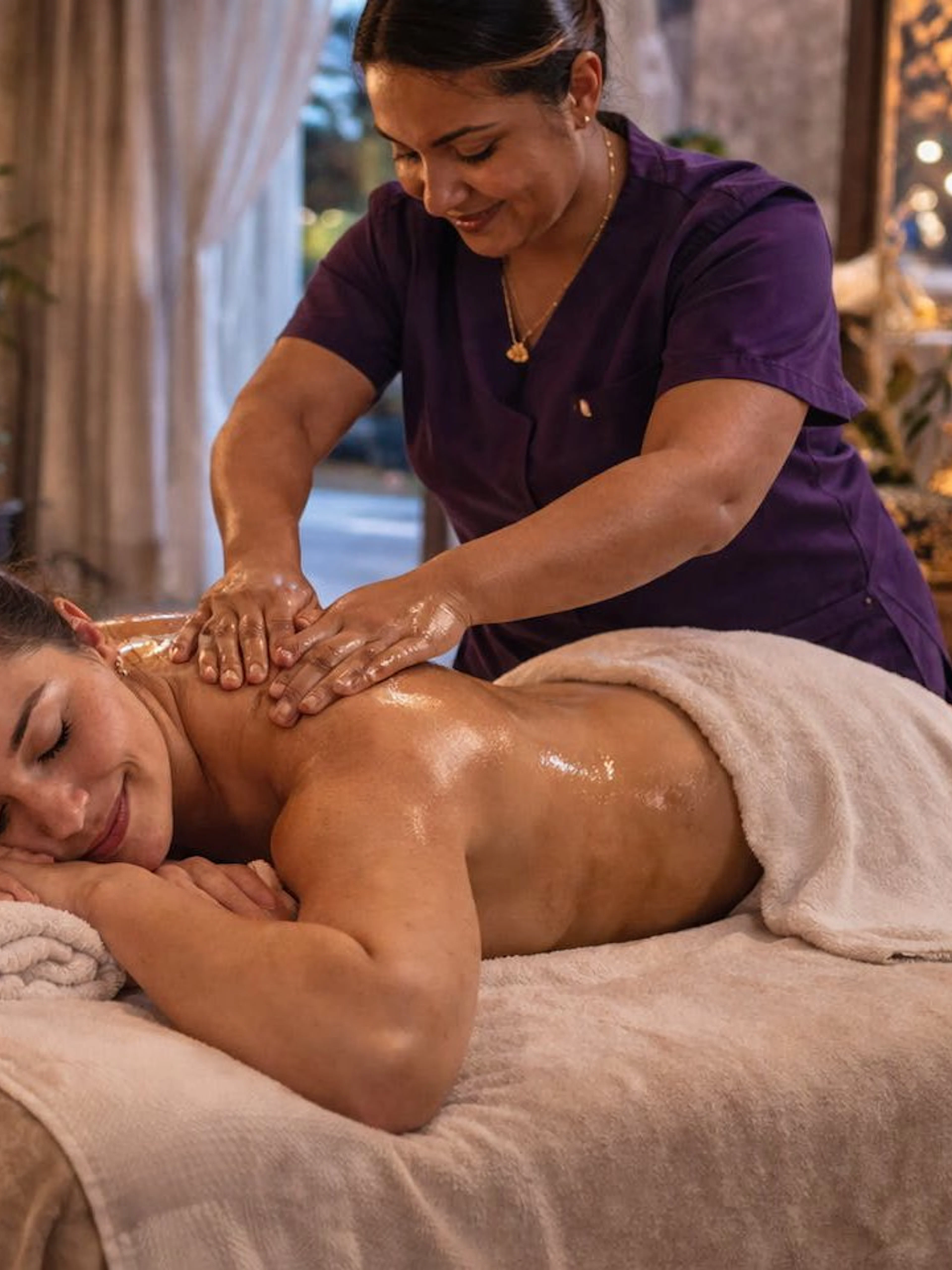 Woman receiving a massage in a serene Agadir spa setting.