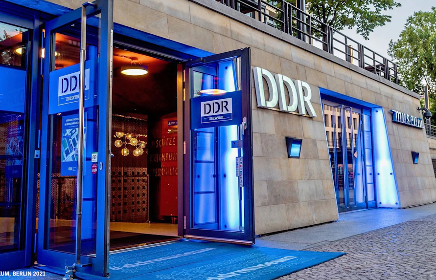 DDR Museum entrance in Berlin, showcasing interactive exhibits on East German history.